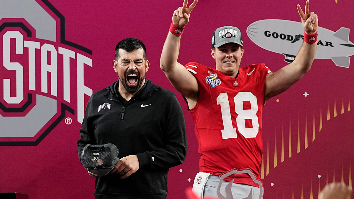 Ohio State Buckeyes head coach Ryan Day celebrates with quarterback Will Howard (18) following the 28-14 win over the Texas Longhorns in the Cotton Bowl Classic College Football Playoff semifinal game at AT&T Stadium in Arlington, Texas on Jan. 10, 2025.