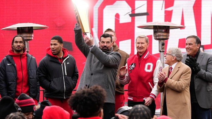 Ohio State Buckeyes head coach Ryan Day hoists the championship trophy during the Ohio State Buckeyes College Football Playoff National Championship celebration at Ohio Stadium