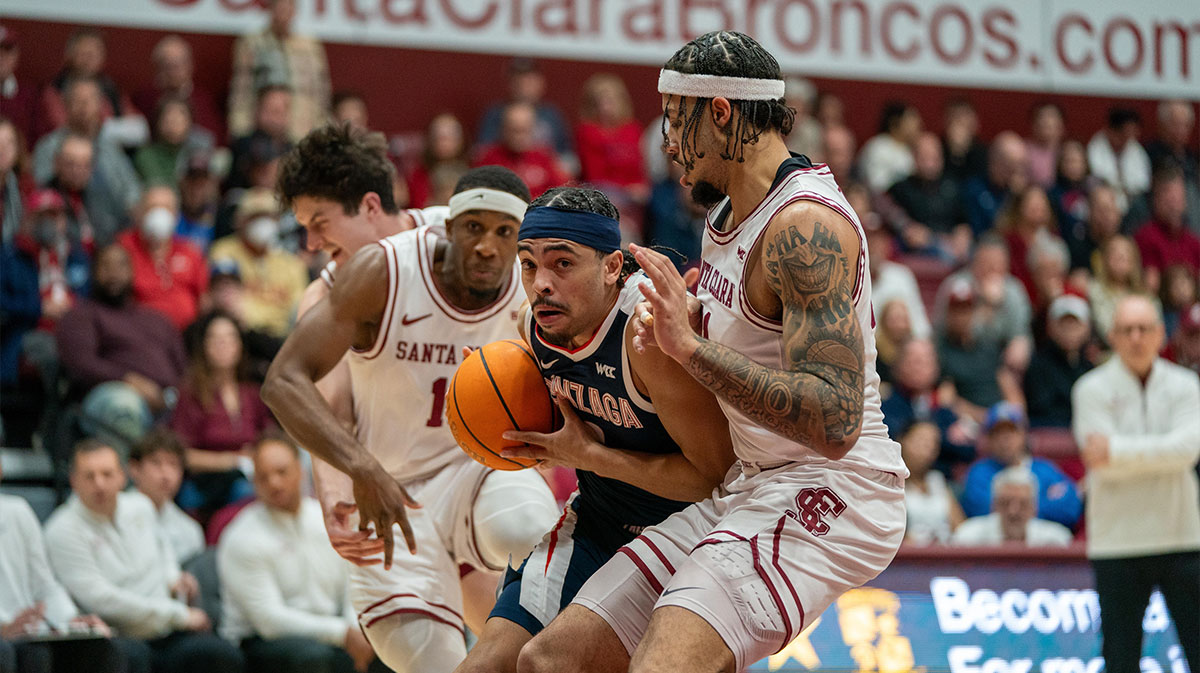 Gonzaga Bulldogs guard Ryan Nembhard (0) drives to the net against Santa Clara Broncos forward Camaron Tongue (21) during the first half at Leavey Center.