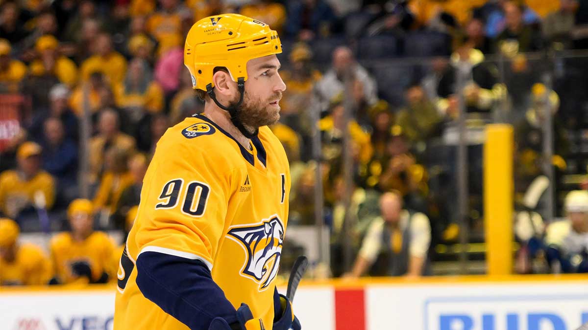 Nashville Predators center Ryan O'Reilly (90) awaits the face off against the Vancouver Canucks during the second period at Bridgestone Arena.