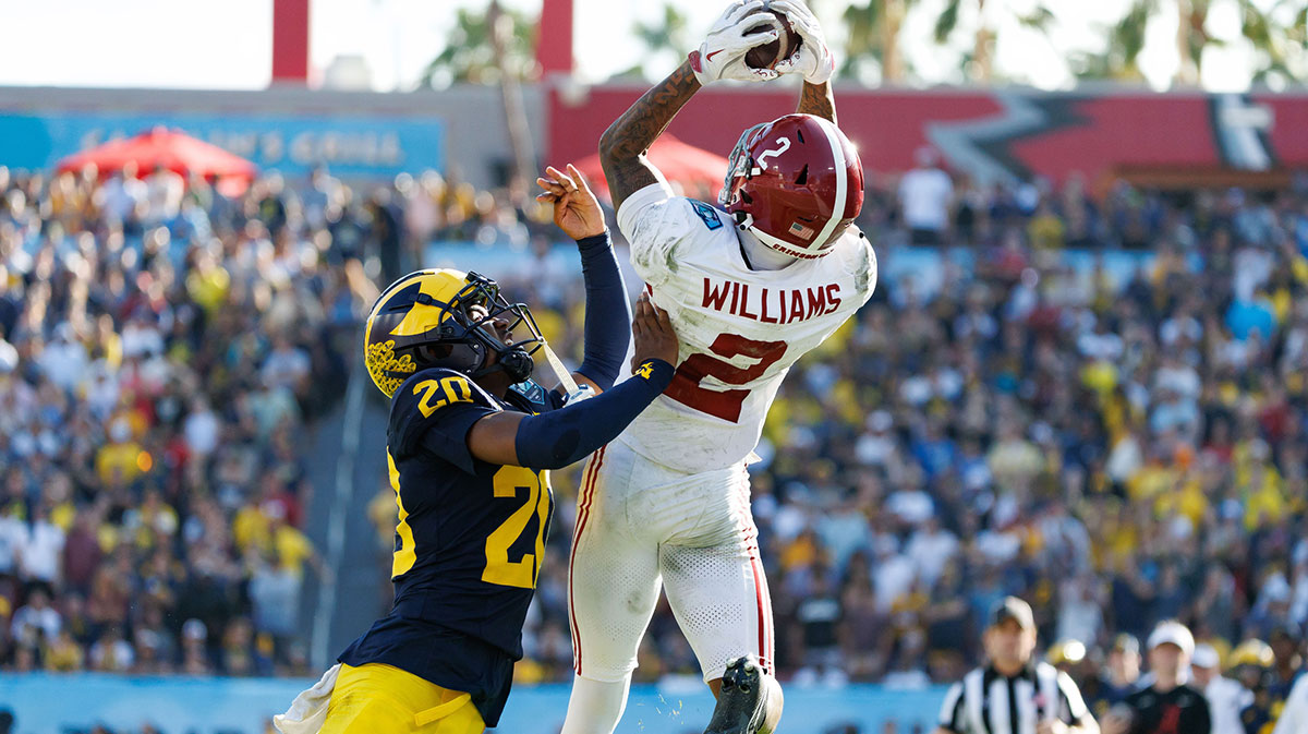 Alabama Crimson Tide wide receiver Ryan Williams (2) makes a catch while Michigan Wolverines defensive back Jyaire Hill (20) pushes him out of bounds during the second half at Raymond James Stadium.