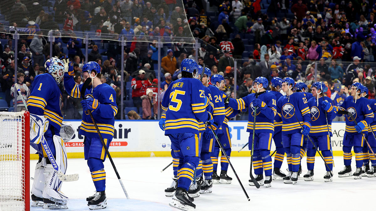 The Buffalo Sabres celebrate a win over the New Jersey Devils at KeyBank Center