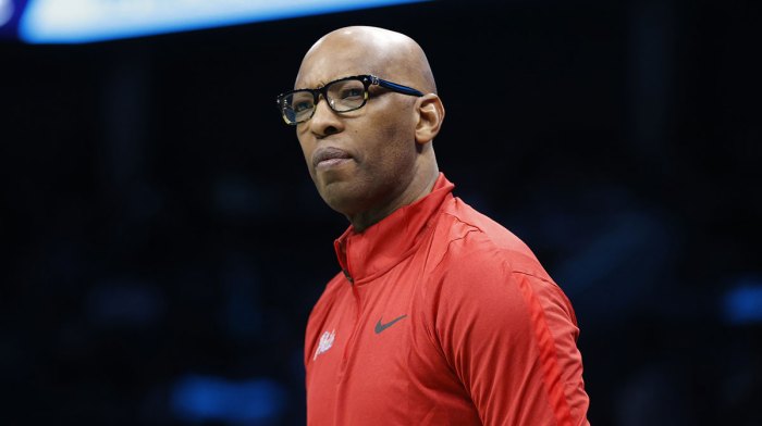 Philadelphia 76ers assistant coach Sam Cassell looks on from the sideline during the first half against the Charlotte Hornets at Spectrum Center.