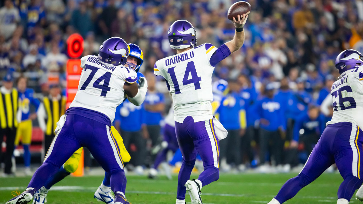 Jan 13, 2025; Glendale, AZ, USA; Minnesota Vikings quarterback Sam Darnold (14) against the Los Angeles Rams during an NFC wild card game at State Farm Stadium. 