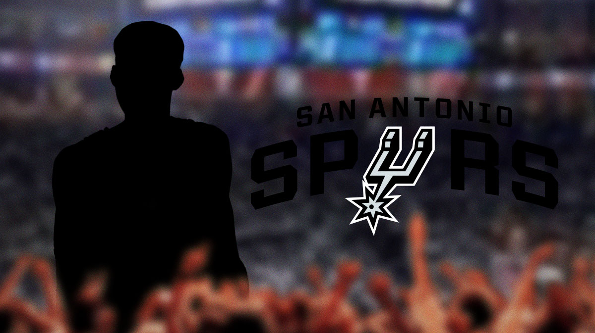 A silhouette of a player image, Spurs logo