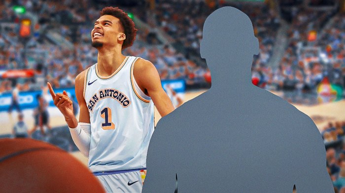 Image of Spurs Victor Wembanyama look happy next to a silhouette of new Spurs center Bismack Biyombo
