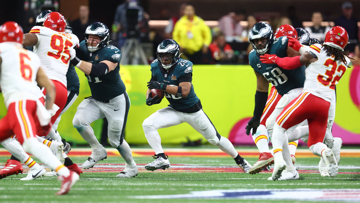 Philadelphia Eagles running back Saquon Barkley (26) runs the ball against the Kansas City Chiefs in the first half in Super Bowl LIX at Ceasars Superdome.