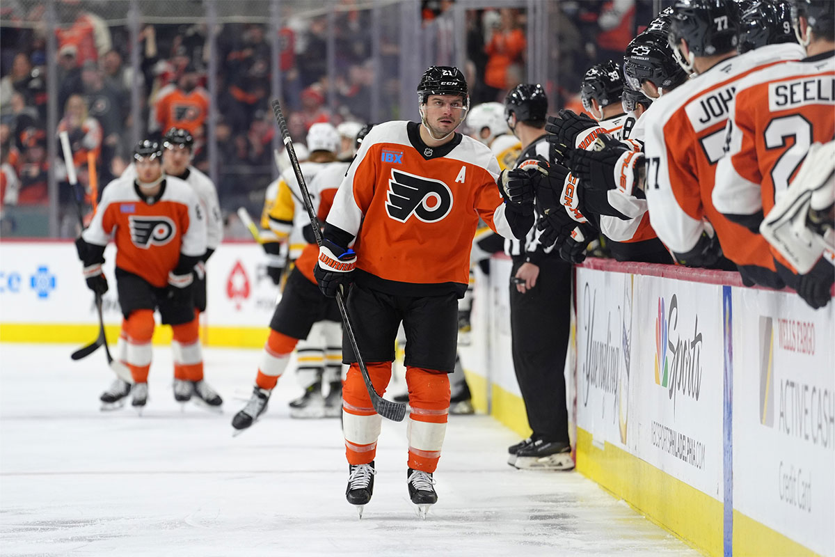 Philadelphia Flyers center Scott Laughton (21) celebrates with teammates after scoring a goal against the Pittsburgh Penguins in the first period at Wells Fargo Center,