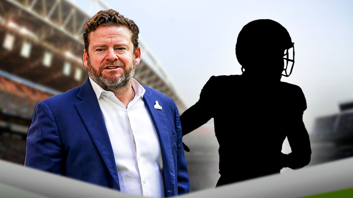 Seahawks general manager John Schneider with a silhouette of the offensive line, and a background of the Seahawks field.