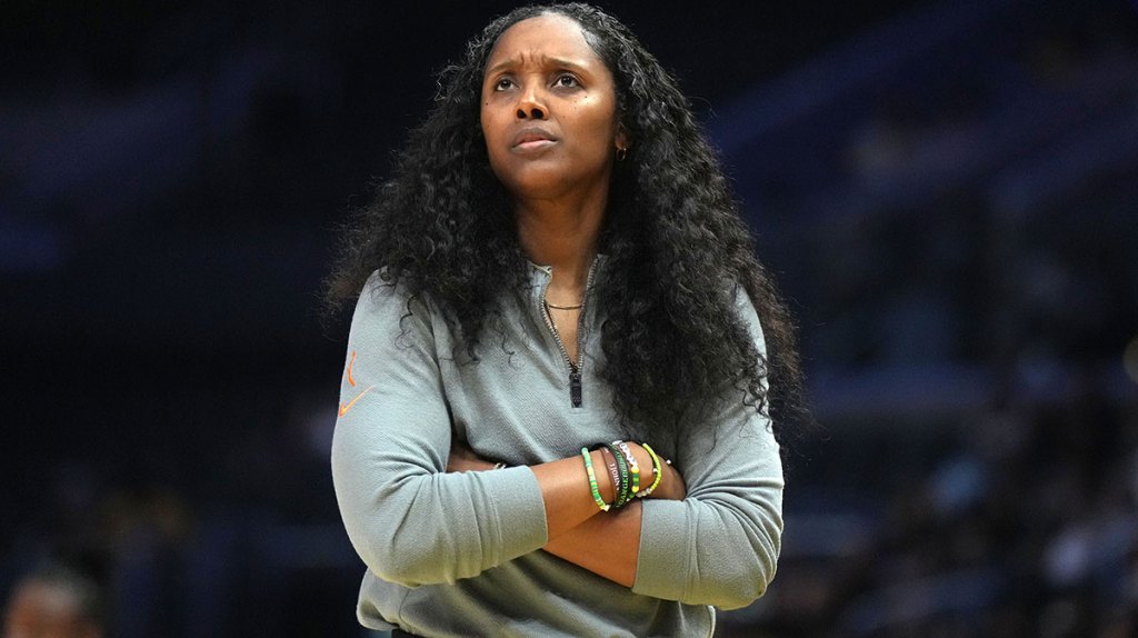 Seattle Storm coach Noelle Quinn reacts against the LA Sparks in the first half.