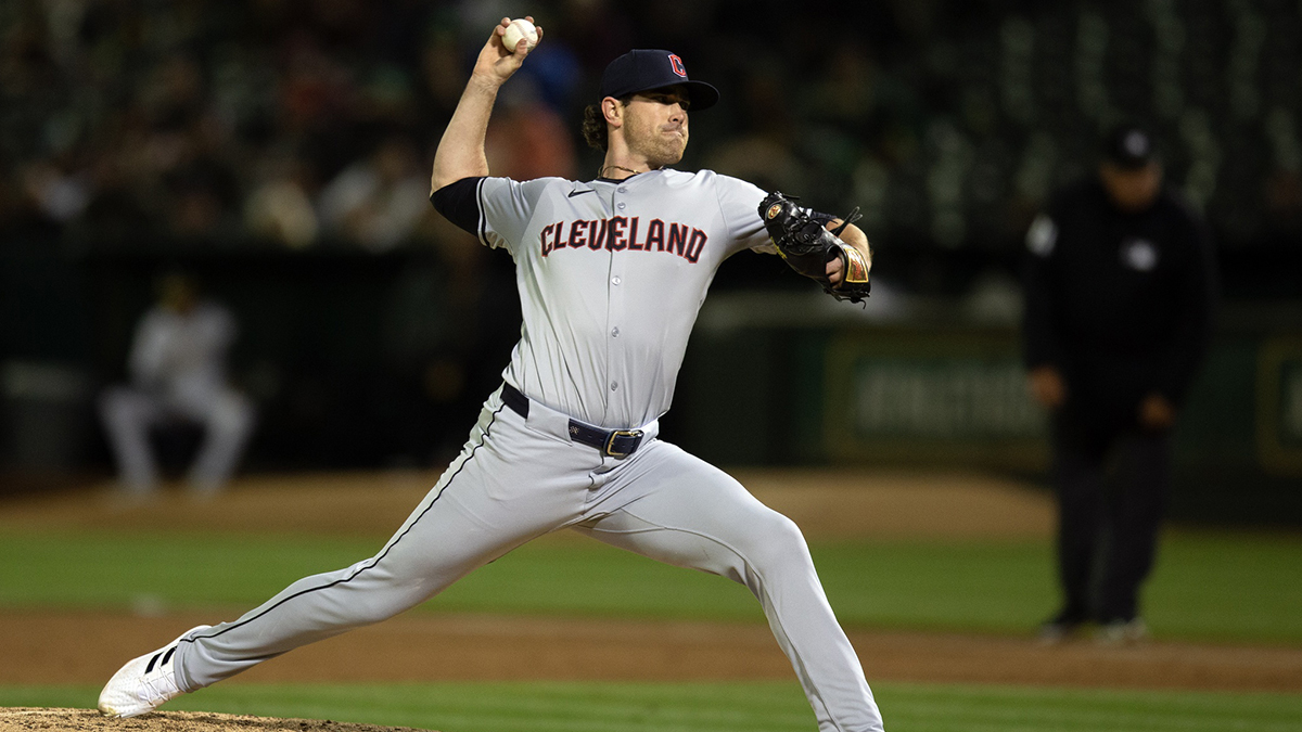 Cleveland Guardians starting pitcher Shane Bieber (57) delivers a pitch against the Oakland Athletics. 