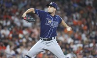 Tampa Bay Rays starting pitcher Shane McClanahan (18) delivers a pitch during the first inning against the Houston Astros at Minute Maid Park.