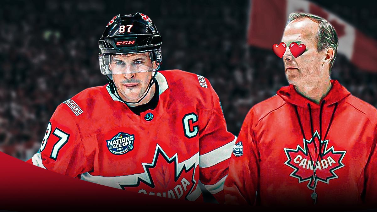 Photo: Jon Cooper with heart eyes looking at Sidney Crosby in action in Team Canada jersey