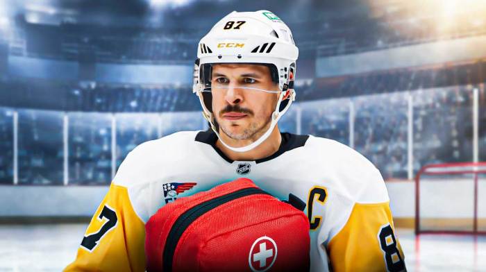 Sidney Crosby with a first aid kit near him.