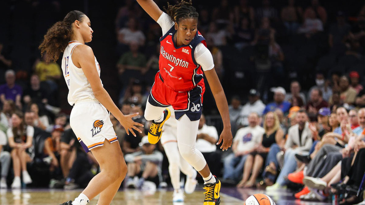 Washington Mystics guard Ariel Atkins (7) flies through the air going for a loose ball on Sept. 5, 2024 at Footprint Center in Phoenix.