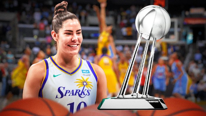 Sparks Kelsey Plum with the WNBA Finals Trophy