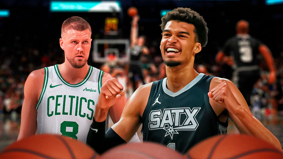 Kristaps Porzingis looking shocked, with Victor Wembanyana standing next to him.