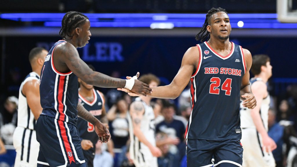 St. John's Red Storm guard Kadary Richmond (1) high-fives St. John's Red Storm forward Zuby Ejiofor (24) after a play during the first half against the Butler Bulldogs at Hinkle Fieldhouse.