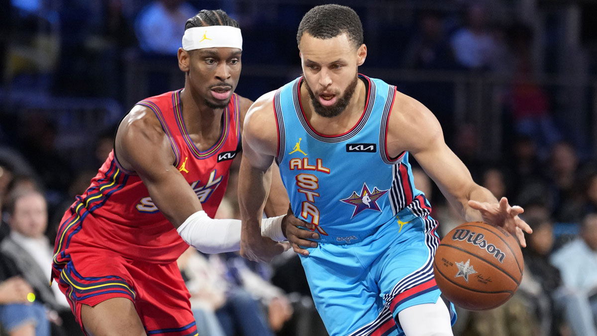 Shaq’s OGs guard Stephen Curry (30) of the Golden State Warriors controls the ball against Chuck’s Global Stars guard Shai Gilgeous-Alexander (2) of the Oklahoma City Thunder during the 2025 NBA All Star Game at Chase Center.