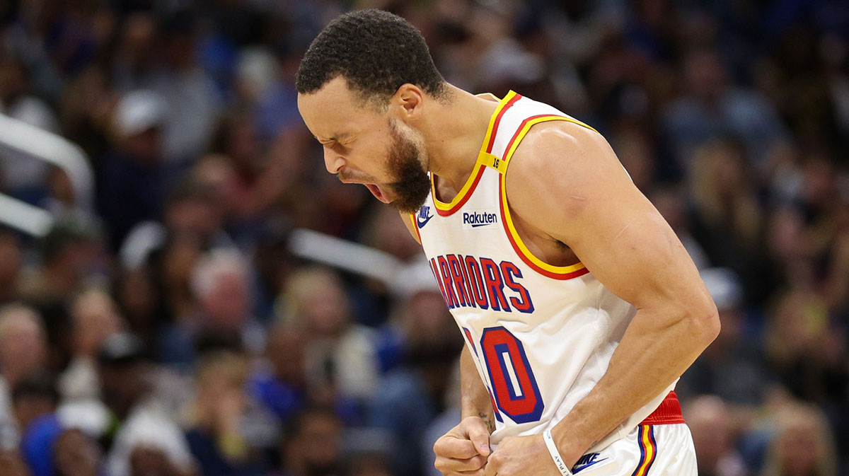 Golden State Warriors guard Stephen Curry (30) reacts after a basket against the Orlando Magic in the second quarter at Kia Center. 