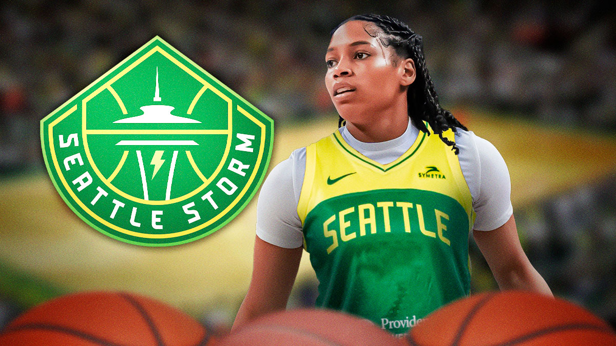 WNBA player Zia Cooke in a Seattle Storm jersey with the Seattle Storm logo in the background, training camp roster