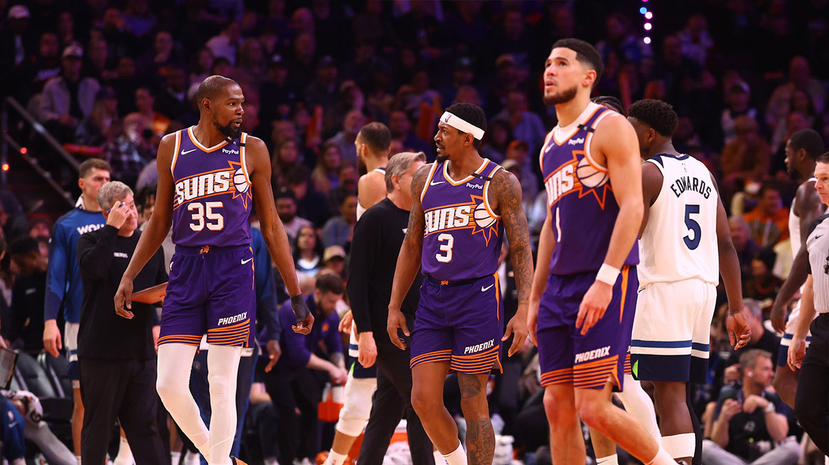     Phoenix Suns forwards front Kevin Durant (35) with guard Bradley Beal (3) and Devin Booker (1) against Minnesota Timbervolves in the footwear center. 