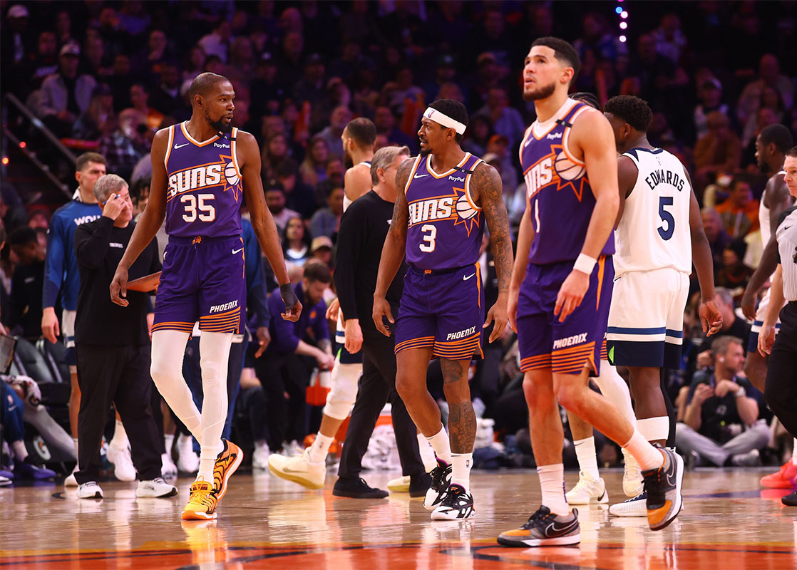 Phoenix Suns forwards front Kevin Durant (35) with guard Bradley Beal (3) and Devin Booker (1) against Minnesota Timbervolves in the footwear center.