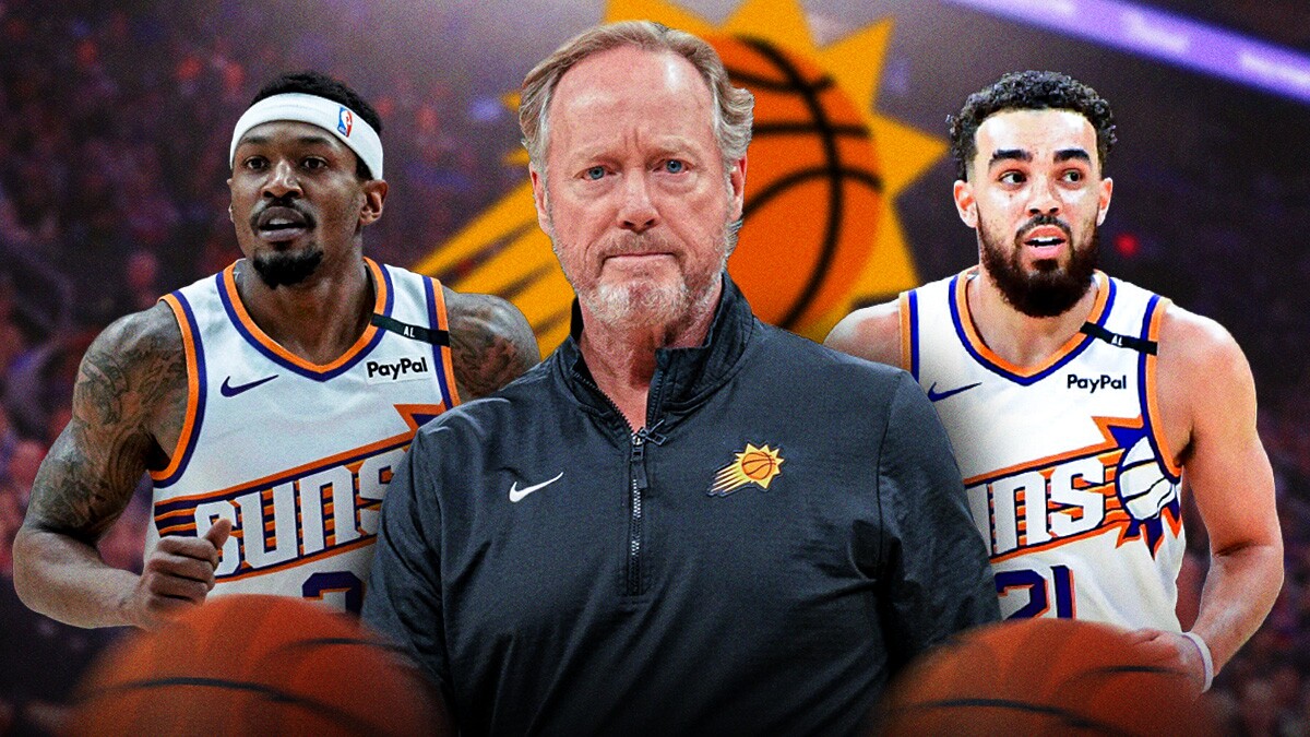 Mike Budenholzer with the Suns logo in the background, as well as Tyus Jones and Bradley Beal next to him.