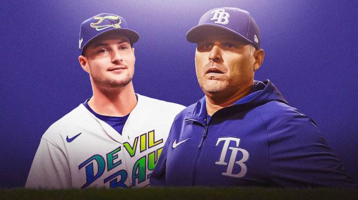 Tampa Bay Rays star Shane McClanahan and Kevin Cash in front of Tropicana Field.