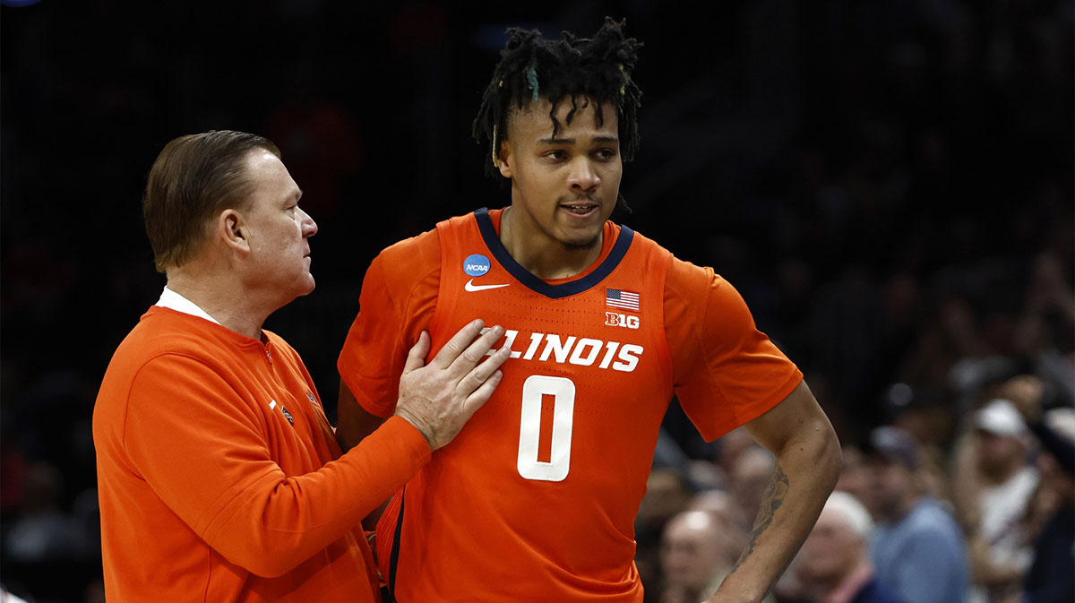 Illinois Fighting Illini head coach Brad Underwood reacts with guard Terrence Shannon Jr. (0) against the Connecticut Huskies in the finals of the East Regional of the 2024 NCAA Tournament at TD Garden.