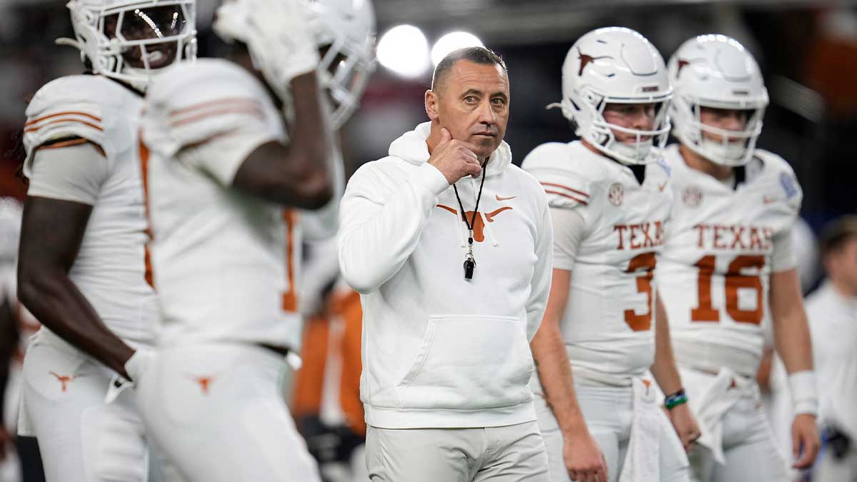 Texas Longhorns head coach Steve Sarkisian leads warm ups prior to the Cotton Bowl Classic College Football Playoff semifinal game between the Ohio State Buckeyes and the Texas Longhorns at AT&T Stadium in Arlington, Texas on Jan. 10, 2025.
