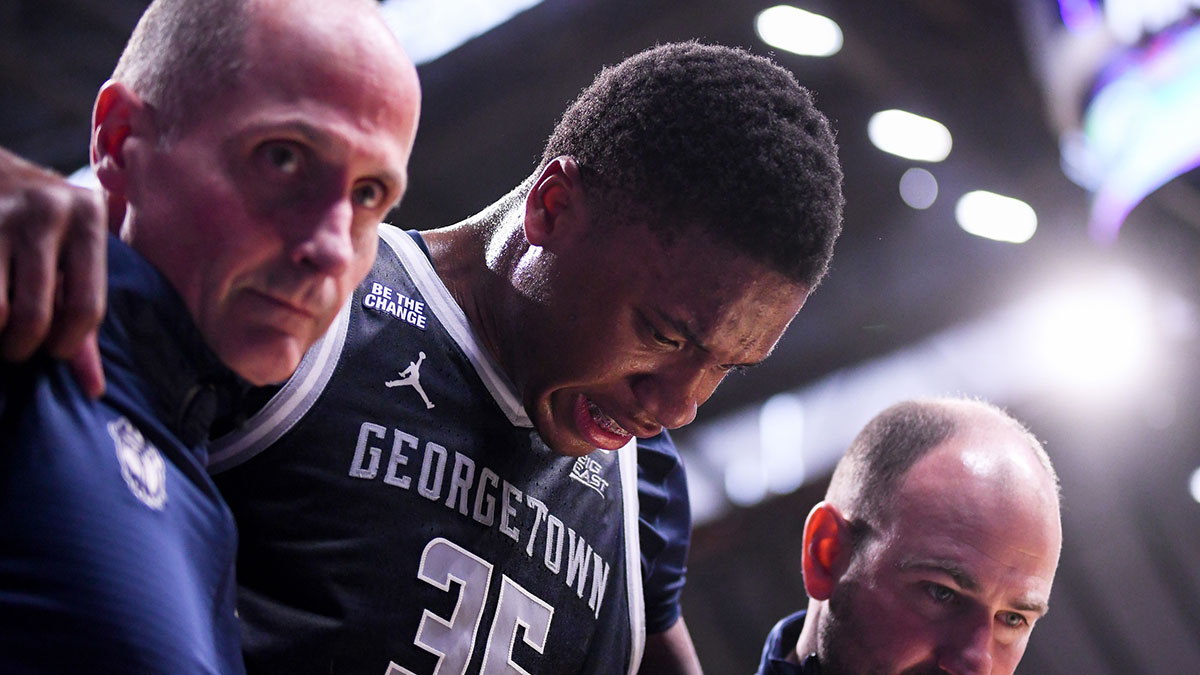  Georgetown Hoyas forward Thomas Sorber (35) is helped off the court after an injury during the first half against the Butler Bulldogs at Hinkle Fieldhouse. 