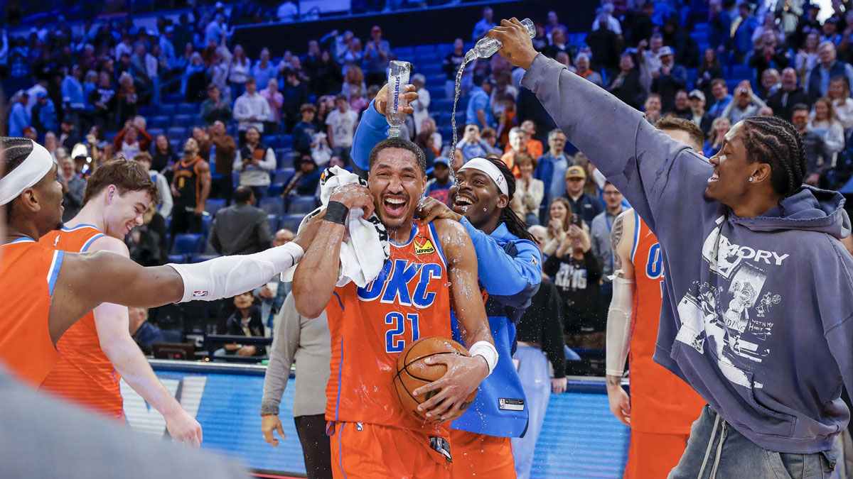 Thunder Guard Aaron Viggins (21) has water on it teammates after its high-point in careers against Sacramento Kings during the second half in Center Pacom