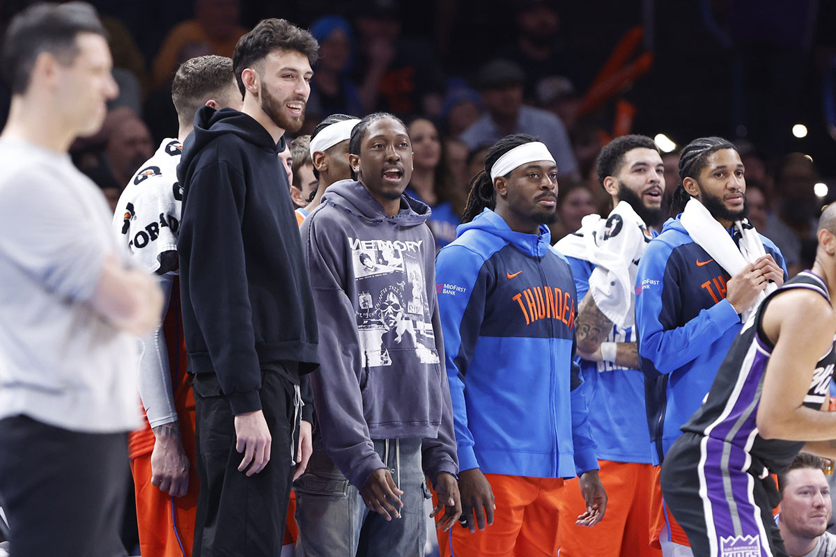 Thunder forward Chet Holmgren (7), forward Jalen Williams (8), guard Luguentz Dort (5), forward Kenrich Williams (34), and guard Isaiah Joe (11) watch as their team plays against the Sacramento Kings during the second half at Paycom Center