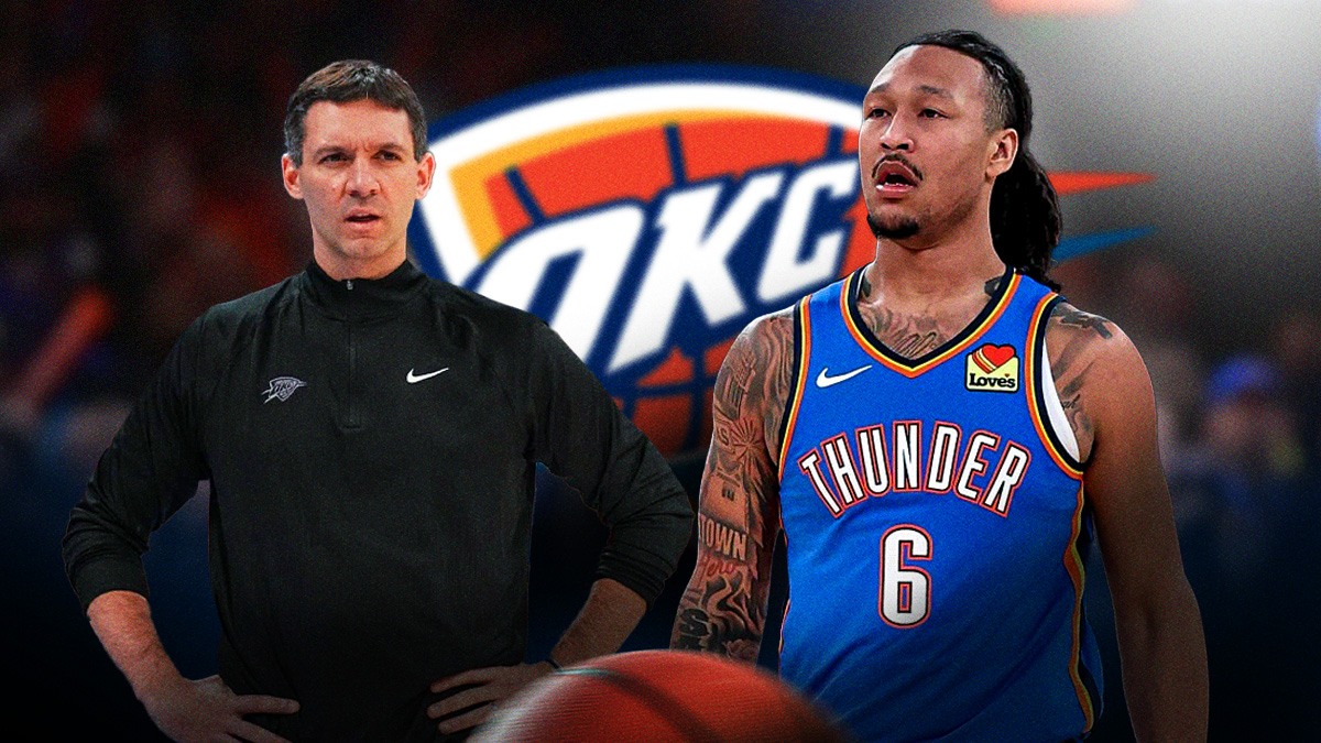 Thunder center Jaylin Williams next to Thunder head coach Mark Daigneault with the Thunder logo in the background