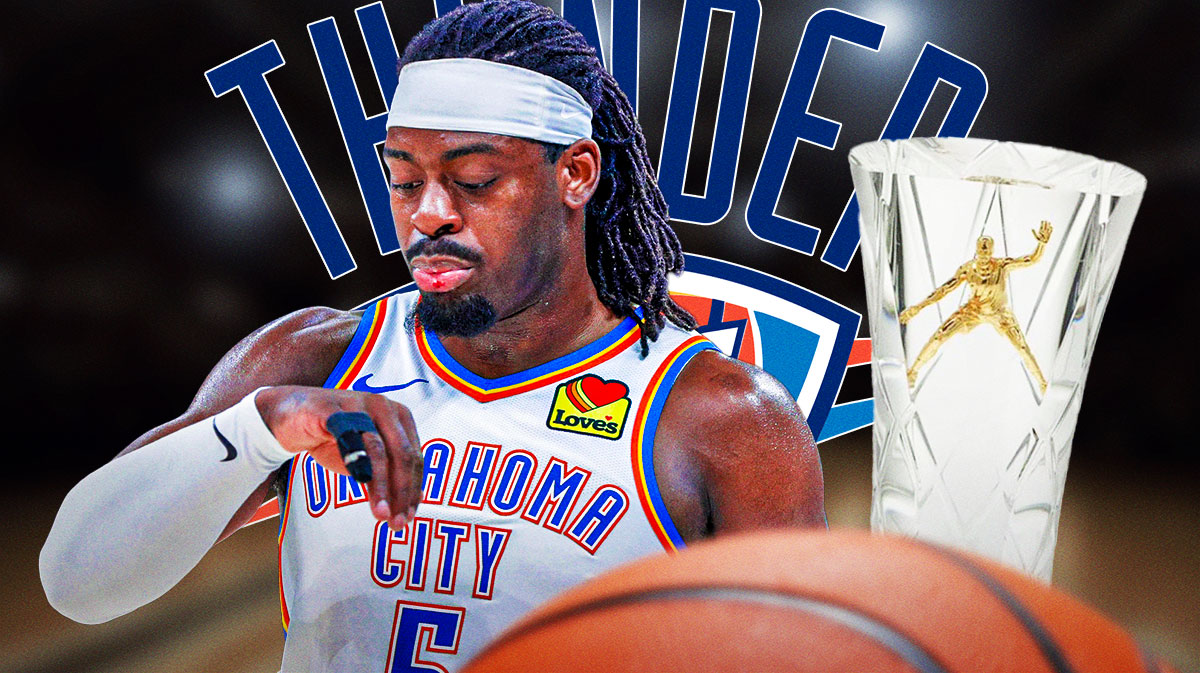Thunder guard Lu Dort next to the NBA's Defensive Player of the Year award with the Thunder logo in the background