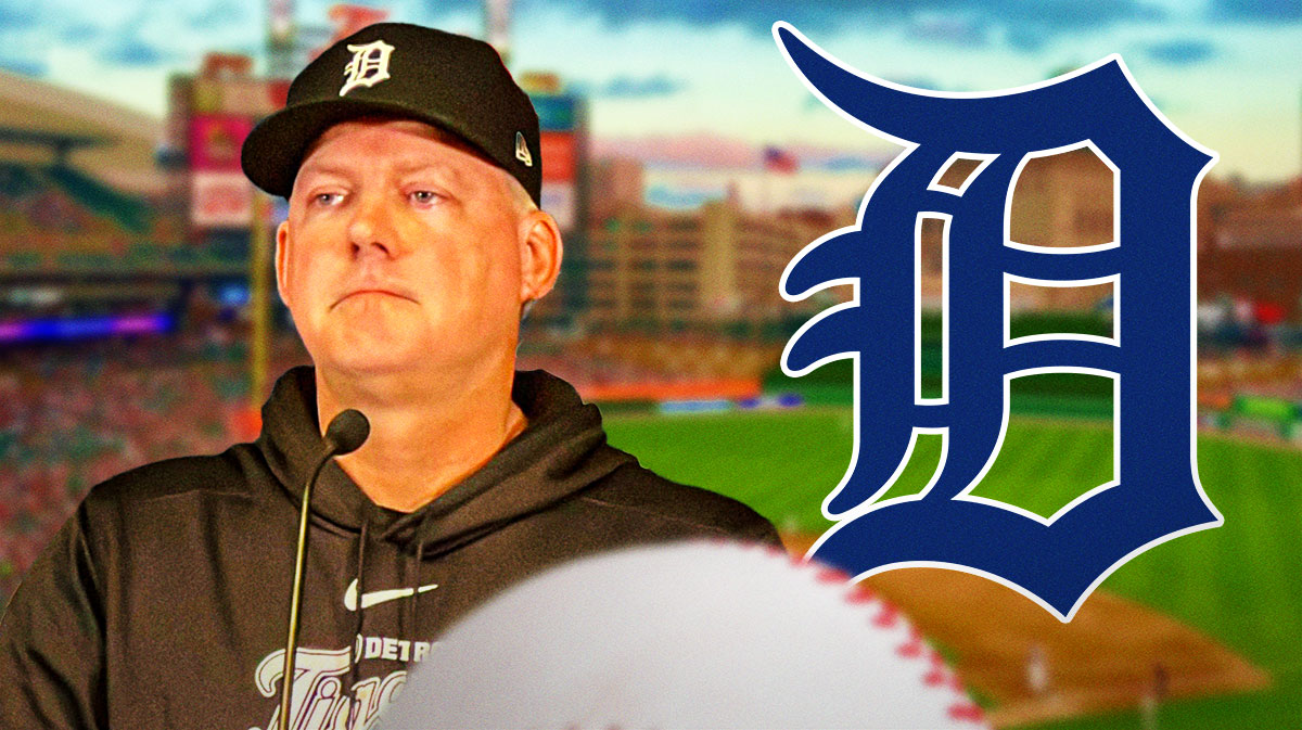 AJ Hinch next to a Tigers logo