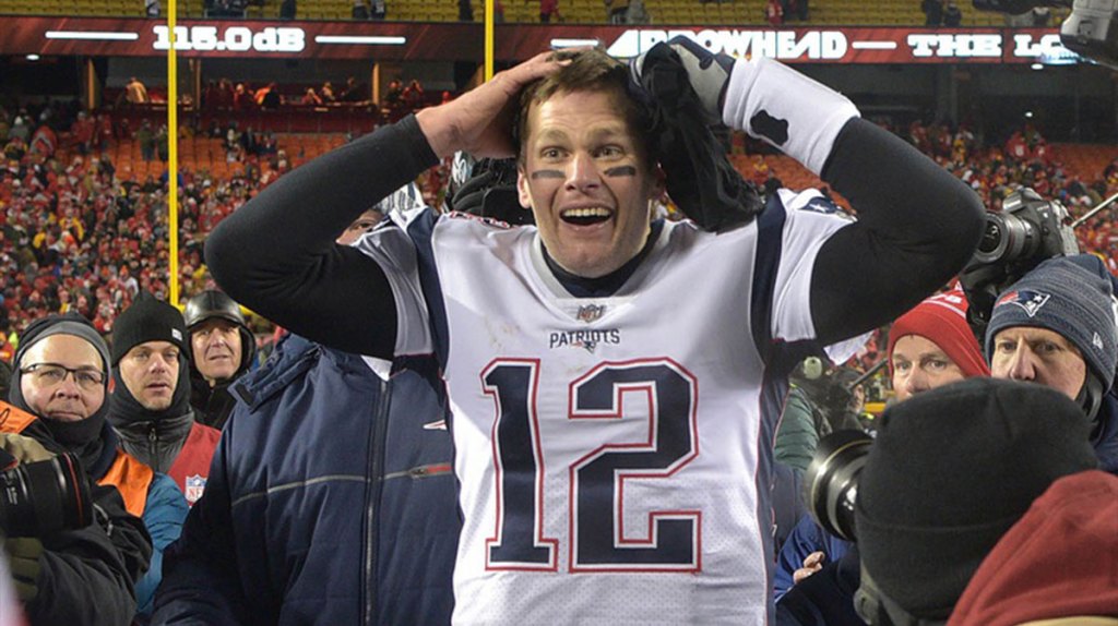 New England Patriots quarterback Tom Brady (12) reacts after defeating the Kansas City Chiefs during overtime in the AFC Championship game at Arrowhead Stadium.