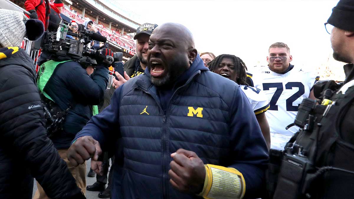 Michigan Wolverines coach Tony Alford reacts to fans heckling him after the game against the Ohio State Buckeyes at Ohio Stadium.