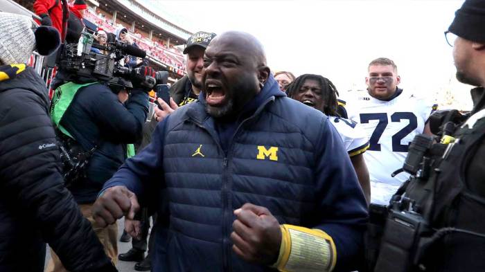 Michigan Wolverines coach Tony Alford reacts to fans heckling him after the game against the Ohio State Buckeyes at Ohio Stadium.