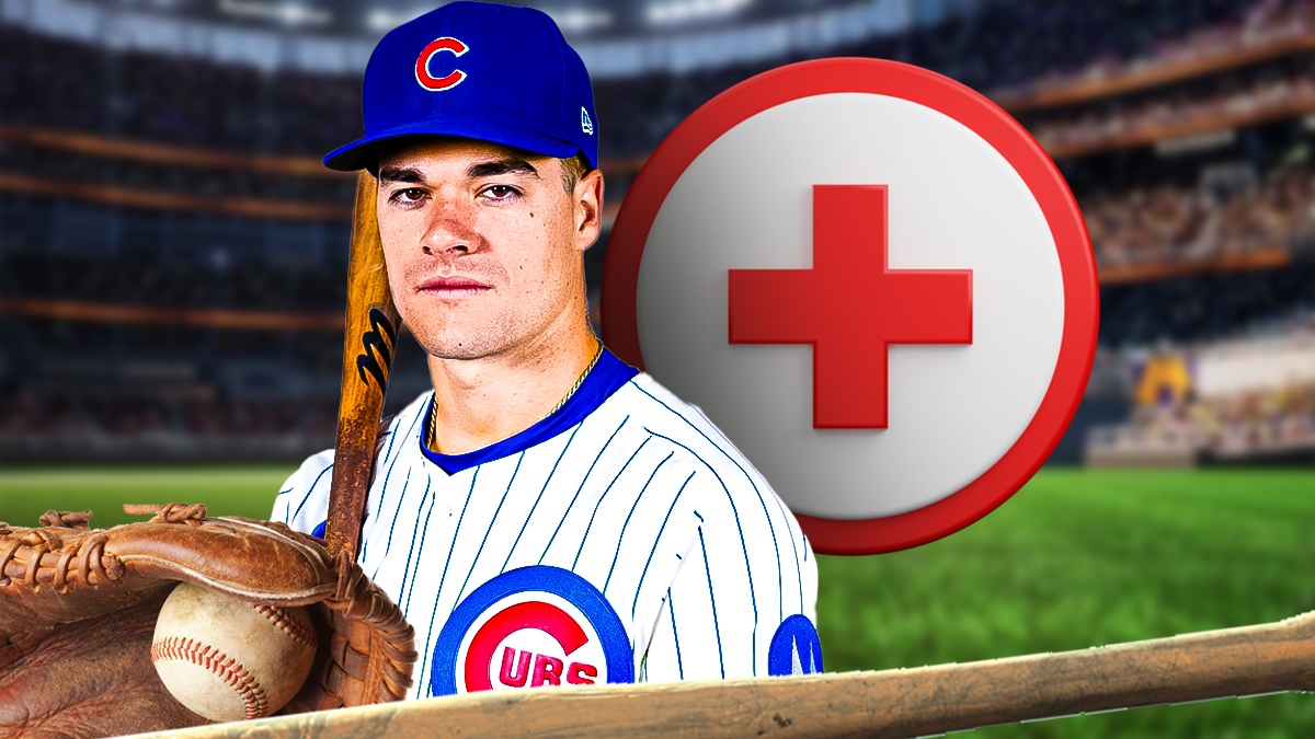 Matt Shaw in a Chicago Cubs uniform with a red and white first aid symbol as shaw's injury status takes a new turn for opening day as the cubs continue spring training.