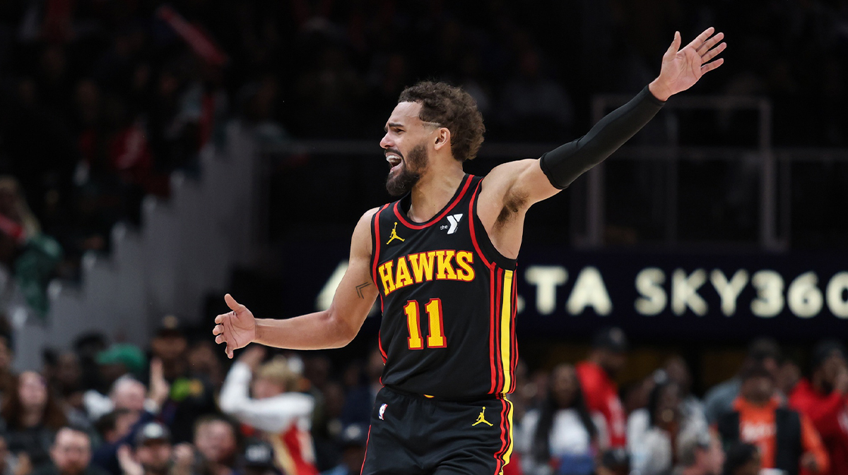 Atlanta Hawks guard Trae Young (11) reacts to referee’s call in the game against the Detroit Pistons during the fourth quarter at State Farm Arena. 