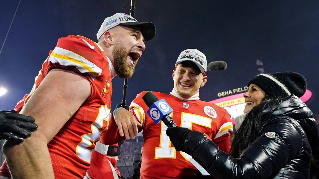 Kansas City Chiefs tight end Travis Kelce (87) and quarterback Patrick Mahomes (15) are interviewed after winning the AFC Championship game against the Cincinnati Bengals at GEHA Field at Arrowhead Stadium