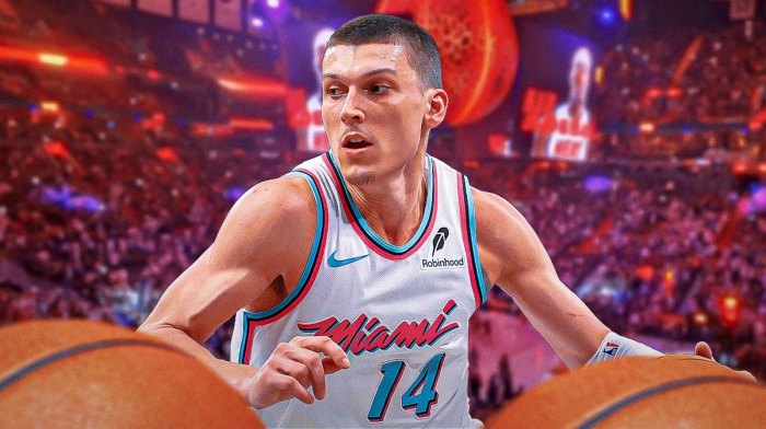 Miami Heat star Tyler Herro in front of Kaseya Center.