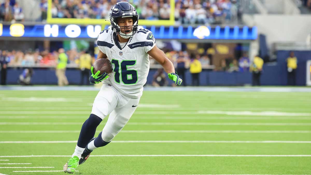 Seattle Seahawks Wide Receiver Tyler Lockett (16) runs down the field baseline at SoFi Stadium for the Seattle Seahawks at Los Angeles Rams Week 18 matchup.