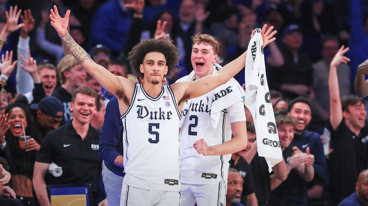 Duke Blue Devils guards Tyrese Proctor (5) and Cooper Flagg (2) celebrate from the bench in the second half against the Illinois Fighting Illini at Madison Square Garden.