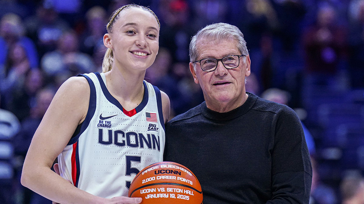 UConn Huskies guard Paige Bueckers (5) is recognized with head coach Geno Auriemma for her 2000 career points before the start of the game against the Villanova Wildcats.