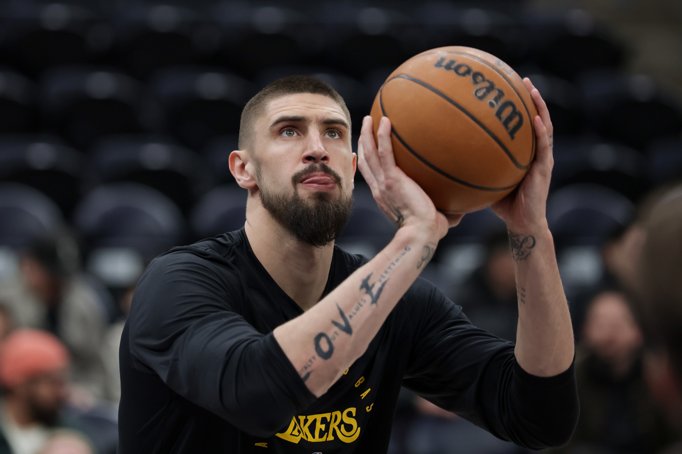 Los Angeles Lekers Center Alek Len (27) was heated before the game against Utah Jazz in Delta Center. 