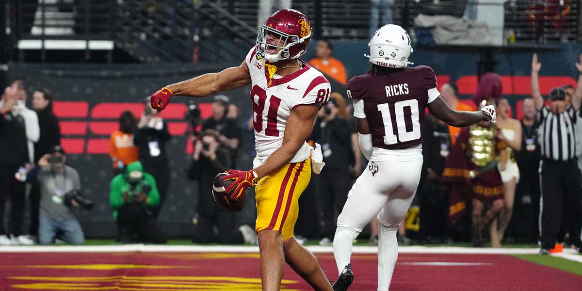 Dec 27, 2024; Las Vegas, NV, USA; iSouthern California Trojans wide receiver Kyle Ford (81) celebrates after scoring on a 7-yard touchdown reception against the Texas A&M Aggies at Allegiant Stadium. Mandatory Credit: Kirby Lee-Imagn Images