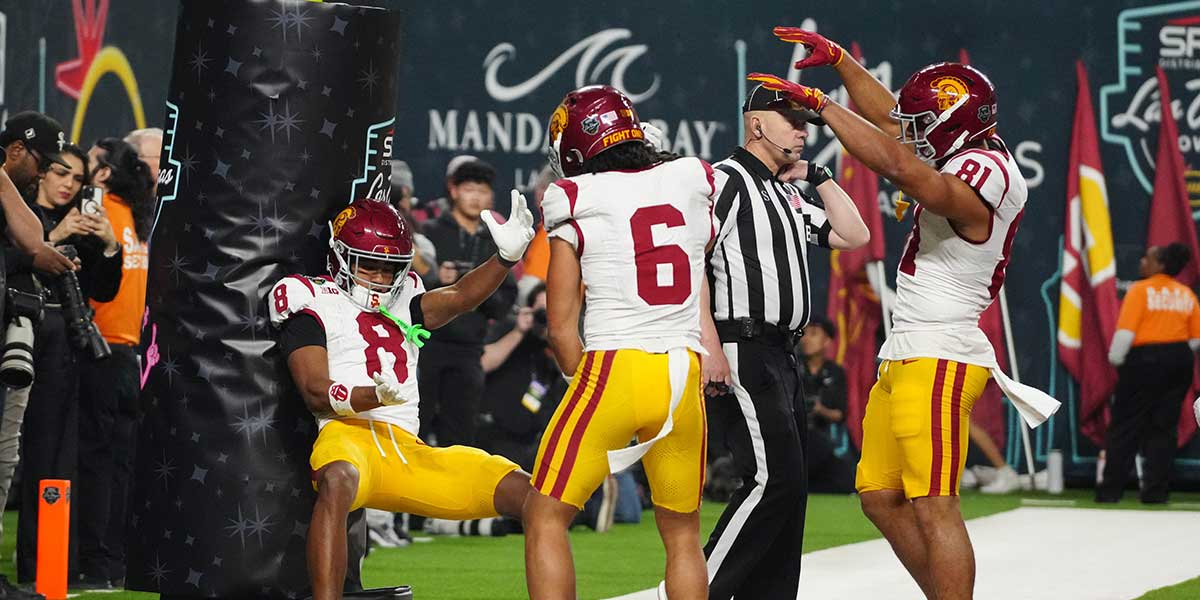 Southern California Trojans wide receiver Ja'Kobi Lane (8) celebrates with wide receiver Makai Lemon (6) and wide receiver Kyle Ford (81) after scoring on a 15-yard touchdown run against the Texas A&M Aggies in the fourth quarter at Allegiant Stadium. Mandatory Credit: Kirby Lee-Imagn Images